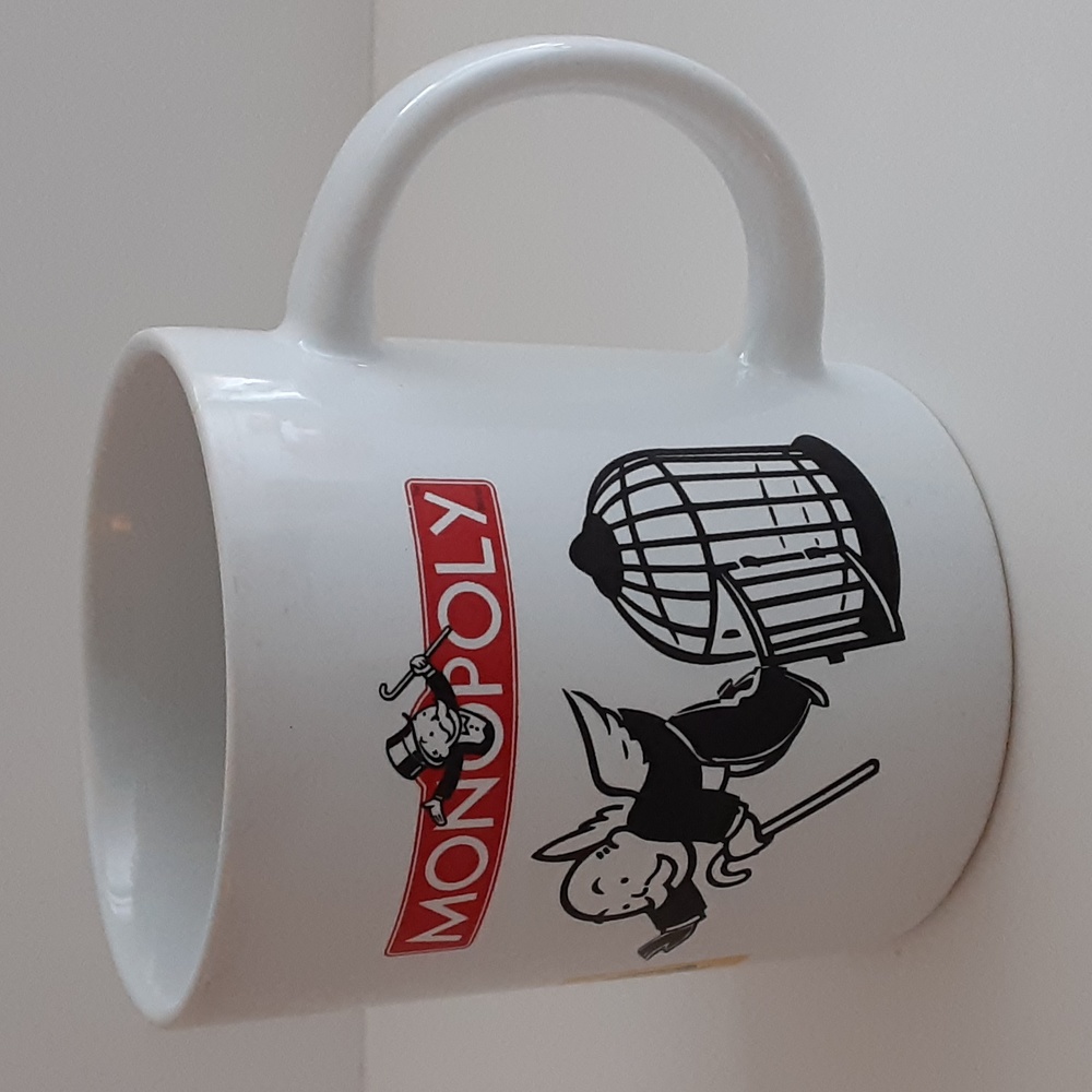 Monopoly Hasbro 2004 Coffee Mug Cup 8 oz Illustrated Get Out of Jail Free Icons